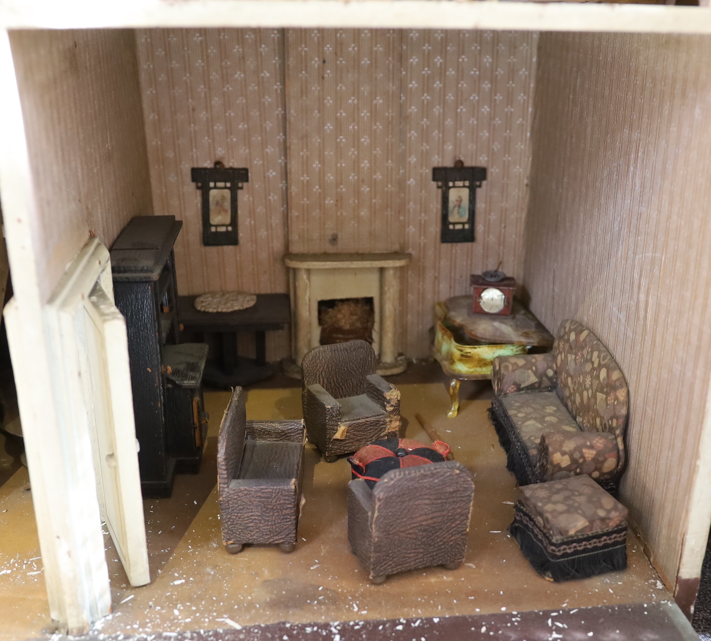 ‘Kits Coty House': An important G. & J. Lines furnished dolls’ house, dated 1912